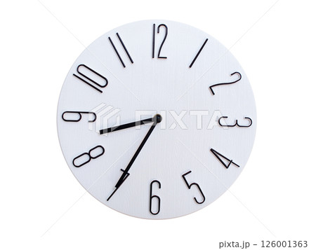 Minimalist Round Wall Clock Showing 08:35 or 20:35. Thin Black Numerals on White Wood Background. Minimalist Round Wall Clock Showing 08:35 or 20:35. Thin Black Numerals on White Wood Background. 126001363