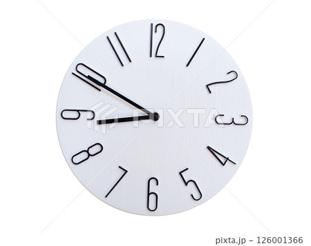 Minimalist Round Wall Clock Showing 08:50 or 20:50. Thin Black Numerals on White Wood Background. Minimalist Round Wall Clock Showing 08:50 or 20:50. Thin Black Numerals on White Wood Background. 126001366