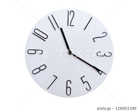 Minimalist Round Wall Clock Showing 11:20 or 23:20. Thin Black Numerals on White Wood Background. Minimalist Round Wall Clock Showing 11:20 or 23:20. Thin Black Numerals on White Wood Background. 126001396