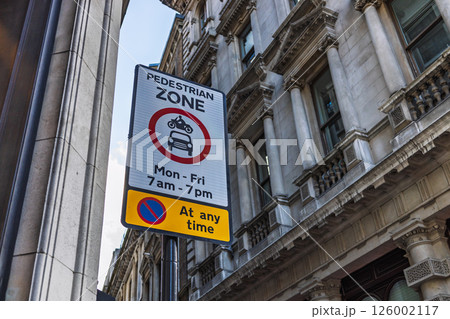 Pedestrian Zone Sign in Urban Street Indicating Restricted Vehicle Access and Safety Regulations Pedestrian Zone Sign in Urban Street Indicating Restricted Vehicle Access and Safety Regulations 126002117