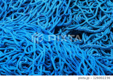 A blue, tangled mass of strings A blue, tangled mass of strings 126002236