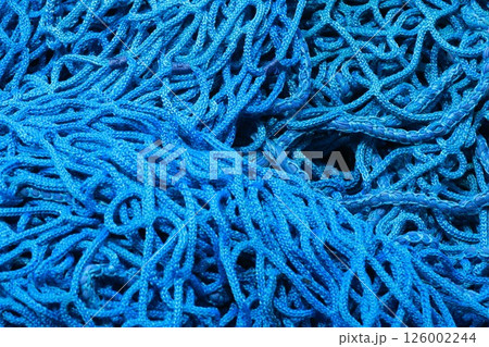 A blue rope with many knots 126002244