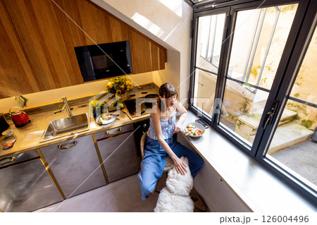 Morning Routine in a Sunny Kitchen with Dog Morning Routine in a Sunny Kitchen with Dog 126004496
