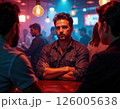 Urban nightlife vibes: stylish men socializing at trendy bar under atmospheric lighting 126005638