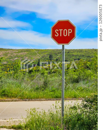 Road sign on the road: speed limit and pedestrian crossings Road sign on the road: speed limit and pedestrian crossings 126005873