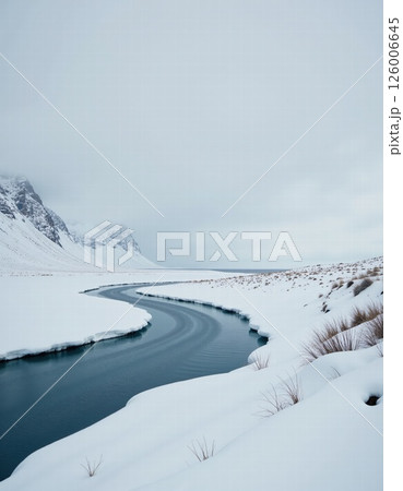 Serene winter landscape with snowy mountains and curving river for nature enthusiasts Serene winter landscape with snowy mountains and curving river for nature enthusiasts 126006645