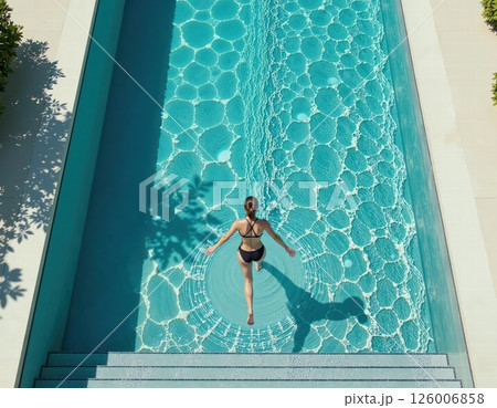 Tranquil poolside oasis with geometric water patterns for modern summer design and relaxation inspiration 126006858