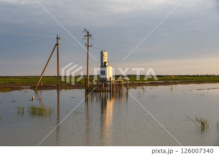 Flooded power lines and transformer station in Kazakhstan after heavy rainfall 126007340