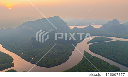 Aerial view of heart island at Mangrove canal in sunrise Aerial view of heart island at Mangrove canal in sunrise 126007377