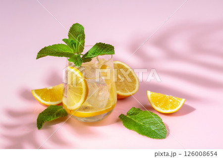 Summer refreshing drink with ice, lemon and mint. Summer refreshing drink with ice, lemon and mint. 126008654