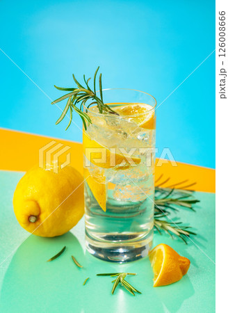Refreshing cocktail with gin, tonic, lemon, and rosemary. Refreshing cocktail with gin, tonic, lemon, and rosemary. 126008666