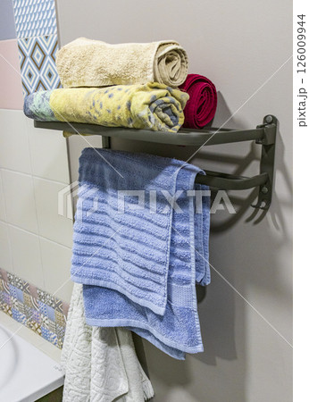 Shot of the towels on the towel holder Shot of the towels on the towel holder 126009944