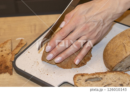 Cuts of freshly baked of home made rye bread Cuts of freshly baked of home made rye bread 126010143