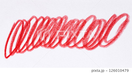 Hand drawn red scribble mark made with crayon or colored pencil on white textured paper Hand drawn red scribble mark made with crayon or colored pencil on white textured paper 126010479