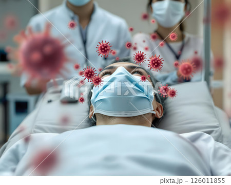 ウィルスが周りを飛ぶ病床の入院患者のアップ 126011855