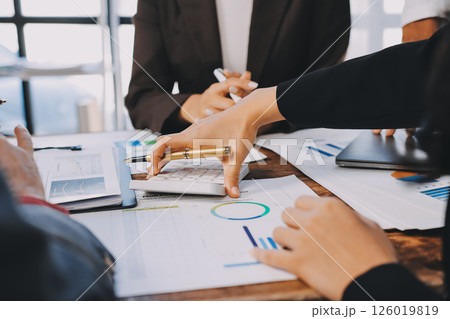 Business financing accounting banking concept. Business woman hand doing finances and calculate on desk about cost at home office. Woman working on desk with using calculator, finance accounting. Business financing accounting banking concept. Business woman hand doing finances and calculate on desk about cost at home office. Woman working on desk with using calculator, finance accounting. 126019819