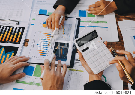Business financing accounting banking concept. Business woman hand doing finances and calculate on desk about cost at home office. Woman working on desk with using calculator, finance accounting. 126019821
