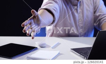 People working together and sharing ideas in a modern business environment. 126020141