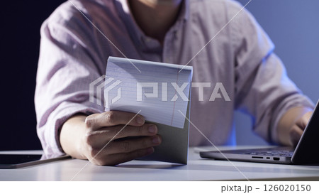 People working together and sharing ideas in a modern business environment. 126020150