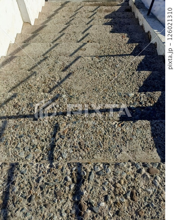 Stone and Cement Staircase in Natural Textures with Shadow Play 126021310