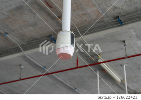 Close up to overhead LED status light of car parking in department store building. Close up to overhead LED status light of car parking in department store building. 126022423