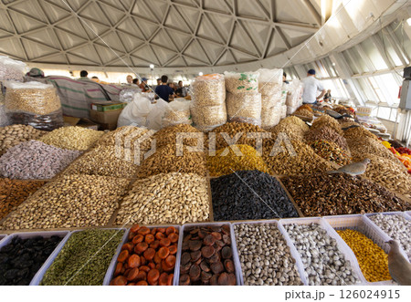 hawker sell the dried fruit and nut in the market Siyob bazaar or so called Slab bazaar is the biggest bazaar in Samarkand. 126024915