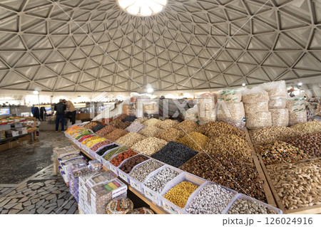hawker sell the dried fruit and nut in the market Siyob bazaar or so called Slab bazaar is the biggest bazaar in Samarkand. 126024916