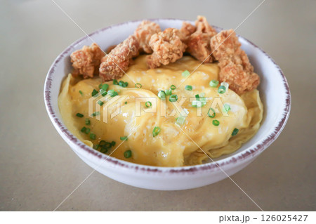 creamy omelet or omelet or omelette or fried egg with fried chicken or crispy chicken or chicken 126025427