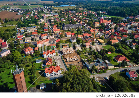 Aerial view of European town with residential buildings and construction site Aerial view of European town with residential buildings and construction site 126026388