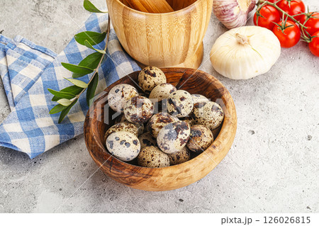 Raw quail eggs in the bowl 126026815