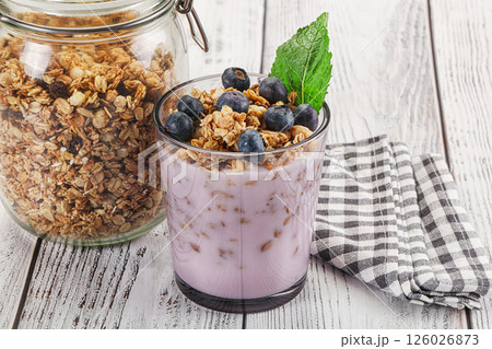 Granola with blueberry and yoghurt Granola with blueberry and yoghurt 126026873