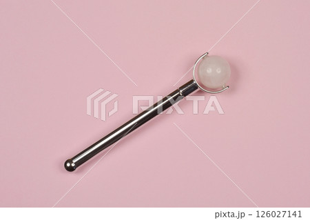 Facial roller with a pink quartz Facial roller with a pink quartz 126027141