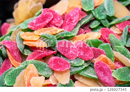 Here is a close up image showcasing a vibrant pile of colorful candies Here is a close up image showcasing a vibrant pile of colorful candies 126027345