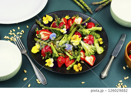 Vegetable salad with strawberries. 126029882
