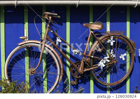 bike on painted house in Oleron island , France bike on painted house in Oleron island , France 126030924
