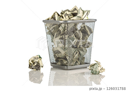 Money in a basket on a white background... 126031788