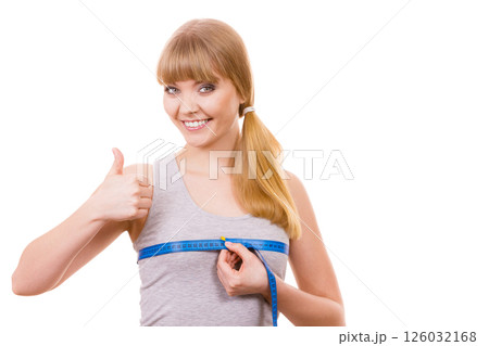 woman measuring her chest breasts isolated woman measuring her chest breasts isolated 126032168
