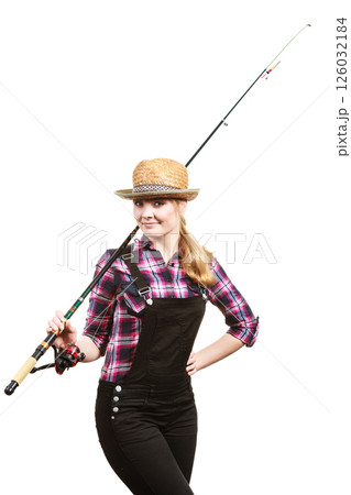 Happy woman in sun hat holding fishing rod Happy woman in sun hat holding fishing rod 126032184