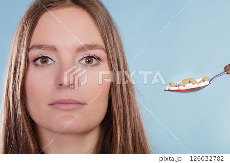 Woman patient taking pills tablets. Drug addict. Woman patient taking pills tablets. Drug addict. 126032782