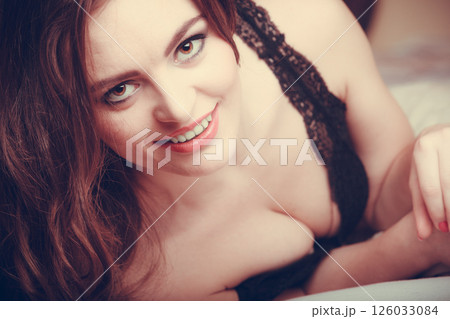 Portrait seductive young woman in lingerie in bed. 126033084