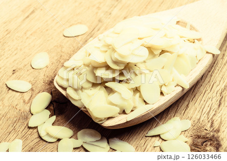 Almond slices on wooden spoon Almond slices on wooden spoon 126033466