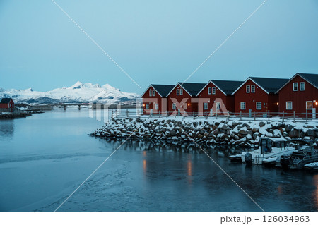 Traditional Red Cabins in Winter Sunrise, Leknes Lofoten Traditional Red Cabins in Winter Sunrise, Leknes Lofoten 126034963