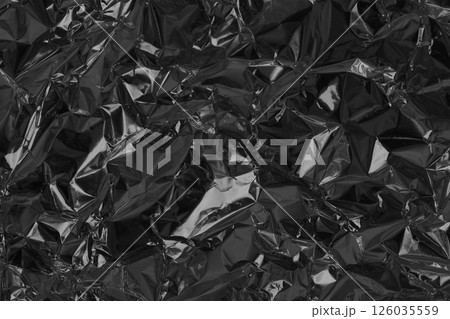 Shiny black grey foil metal texture, abstract wrapping paper for background and design art work. 126035559