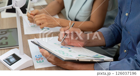 Sustainability ESG meeting with professionals discussing strategies 126037196