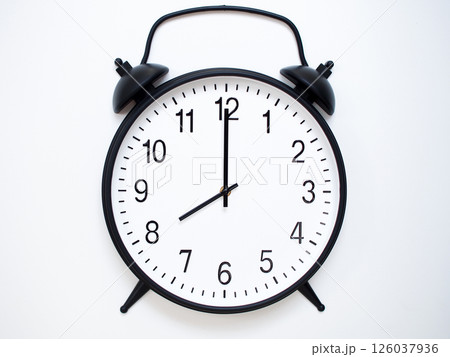 Black Retro Alarm Clock Showing 08:00 or 20:00. Classic Bell Style on White Wood Background. Black Retro Alarm Clock Showing 08:00 or 20:00. Classic Bell Style on White Wood Background. 126037936