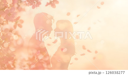 Romantic Couple Silhouette in Blooming Cherry Blossom Garden with Soft Petals and Glow 126038277