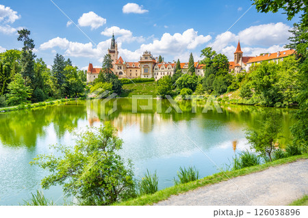 Pruhonice castle and natural park landscape with garden lake on sunny summer day, Pruhenice, Czech Republic. UNESCO World Heritage Site Pruhonice castle and natural park landscape with garden lake on sunny summer day, Pruhenice, Czech Republic. UNESCO World Heritage Site 126038896