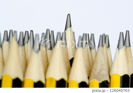 Pencil standing out representing Individuality Uniqueness, Speak Up, Courage and Leadership Pencil standing out representing Individuality Uniqueness, Speak Up, Courage and Leadership 126040703