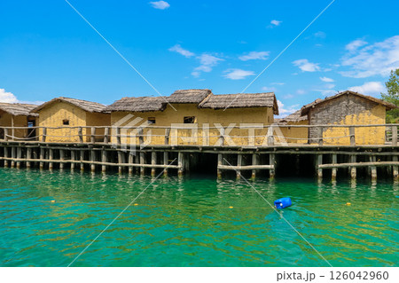 Museum on water, Bay of Bones, prehistoric pile-dwelling, recreation of a bronze age settlement on Lake Ohrid, North Macedonia 126042960