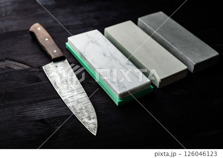 Large Sharp Kitchen Knife And Set Of Sharpening Stones 126046123